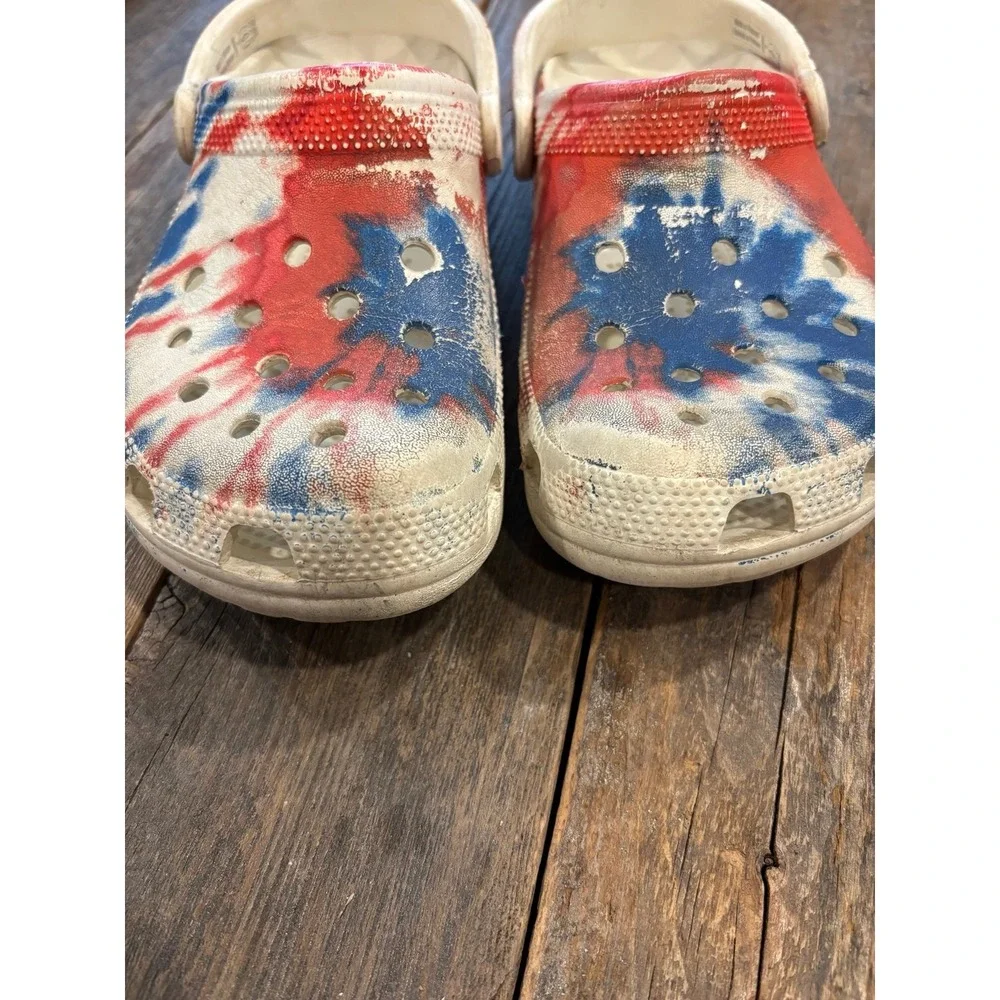 Crocs red, white and blue tie-dye slides